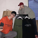 Ouzey Autumn and winter clothing ins Hong Kong style solid color literary male and female couple students loose embroidered sweater