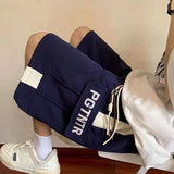 Ouzey Shorts for men in summer hot style printed loose outer wear sports versatile mid-waist fashion brand ins five-point pants trend