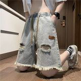 Ouzey American high street retro raw edge ripped denim shorts men's summer thin fashion brand trend handsome five point pants y2k tops