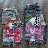 Ouzey Graffiti flower patch printed washed distressed denim shorts hip-hop loose raw edges personalized niche wide-leg mid-pants