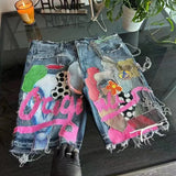 Ouzey Graffiti flower patch printed washed distressed denim shorts hip-hop loose raw edges personalized niche wide-leg mid-pants