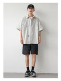 Ouzey 90s Streetwear 2024 Summer New Niche Retro Striped Short-sleeved Shirt Men's Fashionable Hem Drawstring Half-sleeved Shirt Jacket